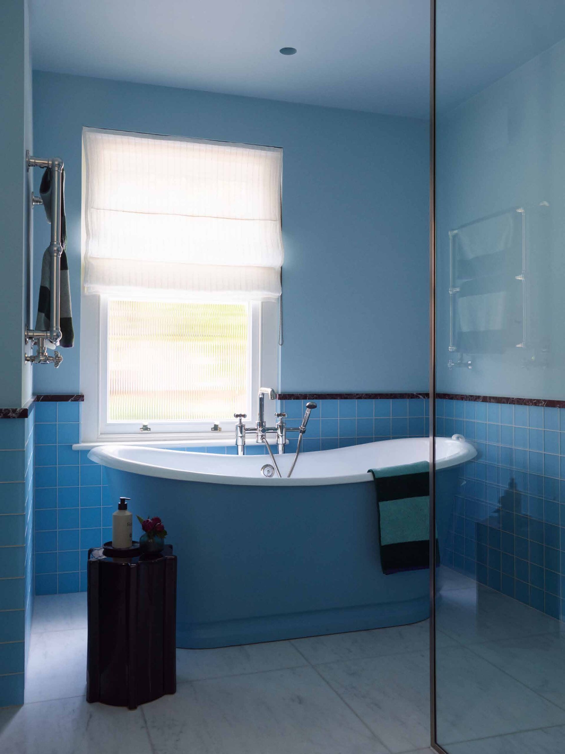 Family bathroom with freestanding bath
